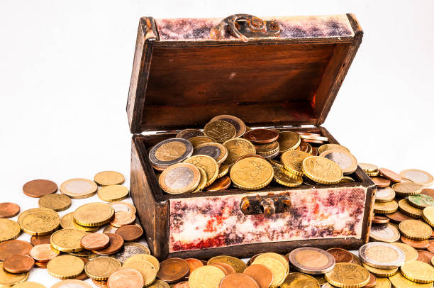 A golden treasure chest on a white background with clipping path.