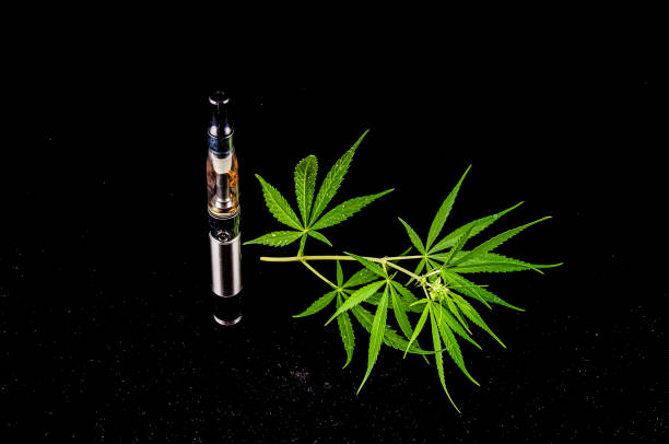 istock A bottle of marijuana and a vaporizer are on a table 2149537529