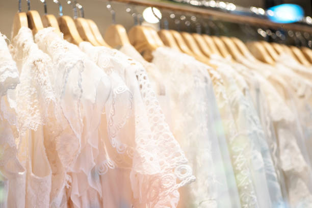 istock A few beautiful white dresses on a hanger 2149539741
