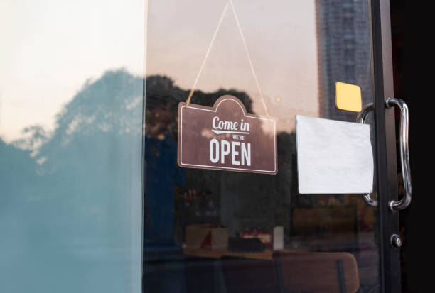 istock open sign hanging outside a restaurant, store, office or other 2149539748