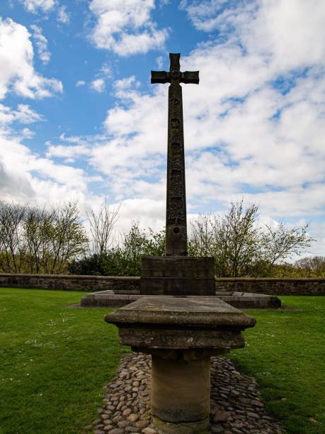 istock Tombstone In Front Of Cross. 2149540564