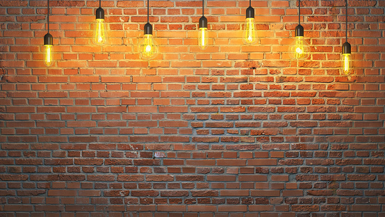 Brick wall illuminated with edison lamps. 3d rendering