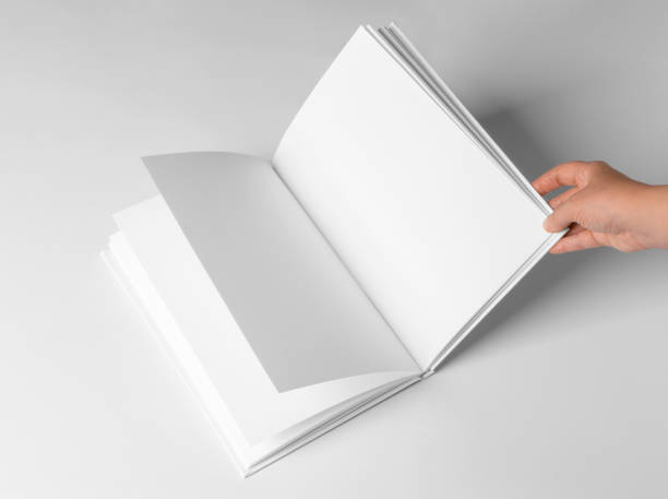 istock Empty Book Template on White Background, hands Open book with blank pages. Mock up for design 2149544645