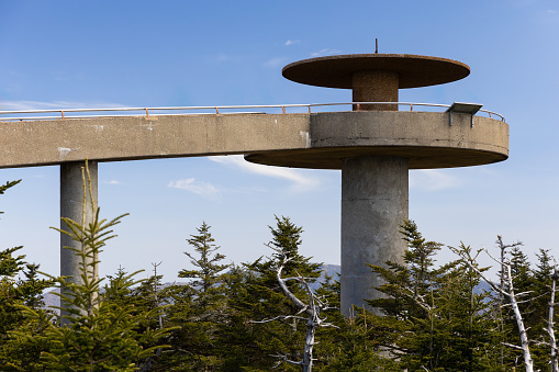 Clingmans Dome is located in the Great Smoky Mountains National Park in North Carolina with a circular lookout tower with panoramic views and an elevation of 6,643 feet.