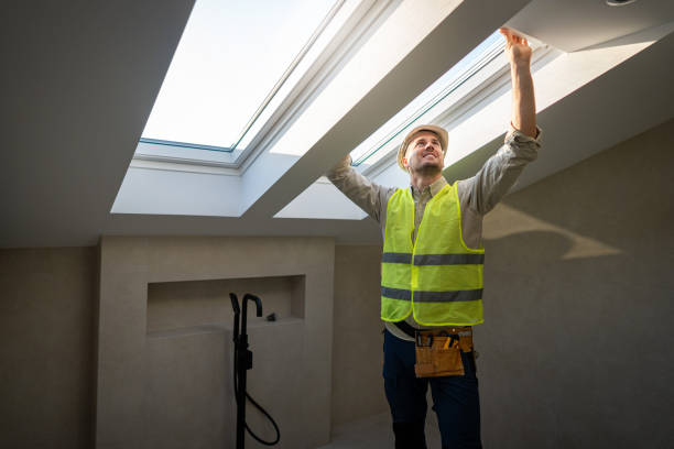 istock The craftsman carefully checks the window, ensuring it is properly aligned and secured 2149549084