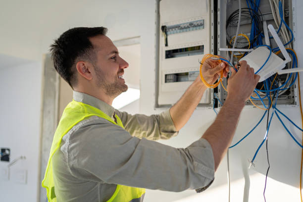 istock Technician installing the Wi-Fi router in the apartment 2149549102