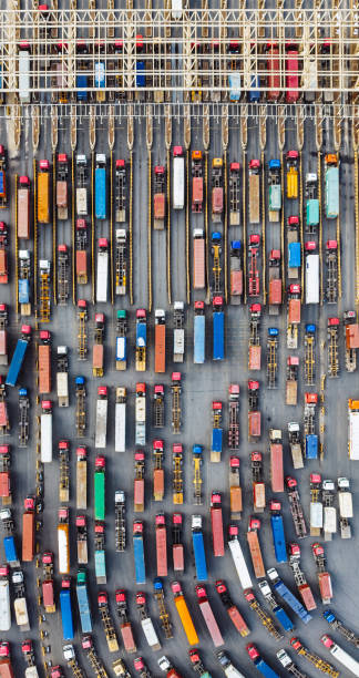 istock Aerial View of Trucks Entering Container Terminal 2149554190