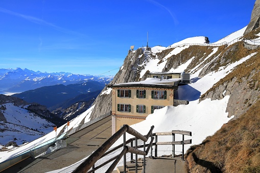 Mount Pilatus, Switzerland – February 05, 2024: Visiting the summit of Mount Pilatus on a sunny day in winter. Popular travel destination, Canton of Lucerne, Switzerland, Europe.