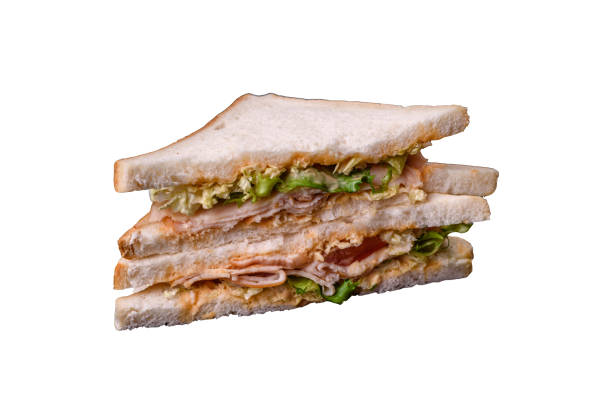 istock Delicious nutritious sandwich with toast bread, ham, tomatoes, cheese and sauce 2149562485