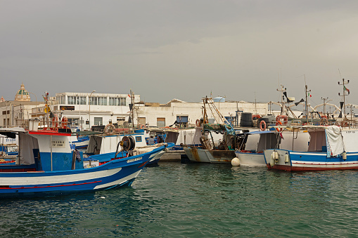 fishing boats in the harbor of Trapani in Sicily