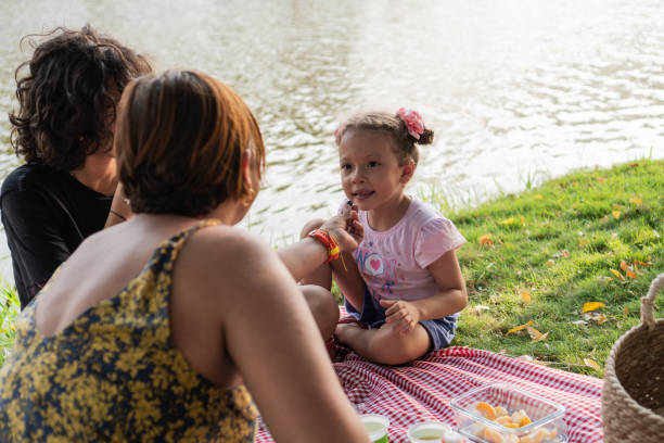 istock Lakeside Picnic with Family 2149568031