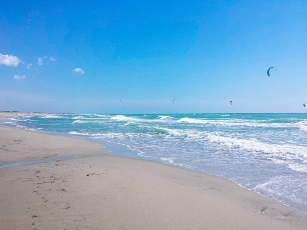 istock Kitesurfing in the blue sea 2149569680