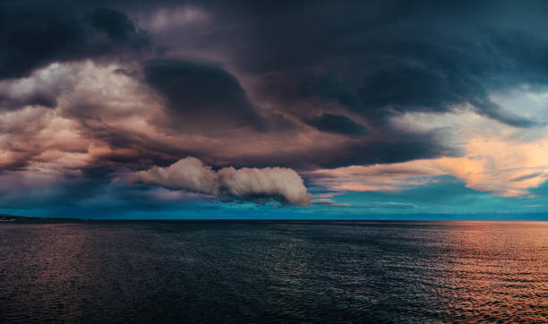 istock Dramatic landscape of lake with clouds at sunset, panoramic view 2149570796