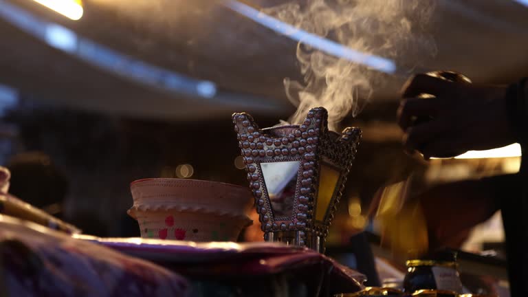 Traditional Arabic incense bukhoor agar wood burner with smoke