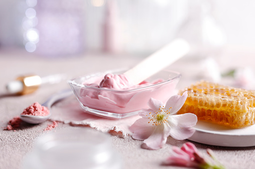 Pink moisturizer with wild rose flower and honey