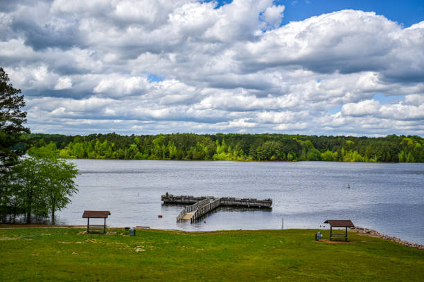 istock Wide Angle Overview Fishing Dock on Falls Lake after Storm 2149575435