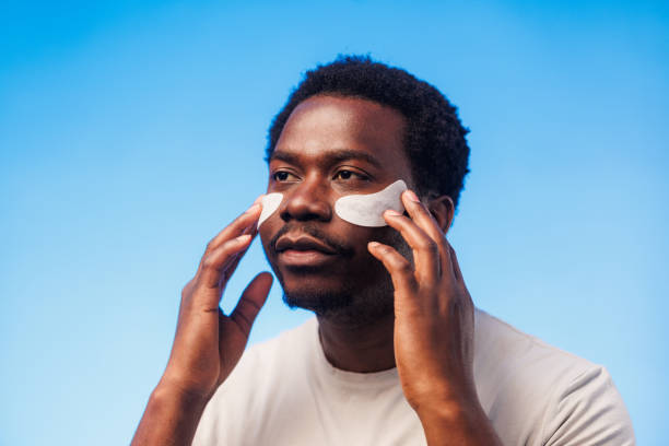 istock Headshot of a young man with under-eye patches 2149576039