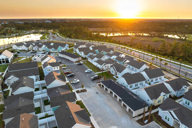 istock Construction in new developing suburban area. Development of residential housing in American suburbs. Real estate market in the USA 2149577060