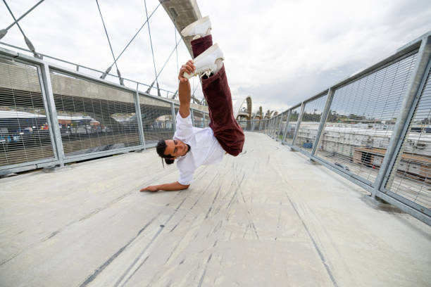 Man breakdancing in the streets.