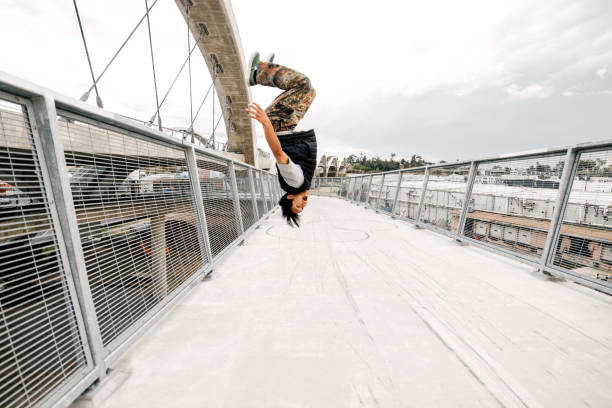 istock Young man backflipping in the city streets 2149581207