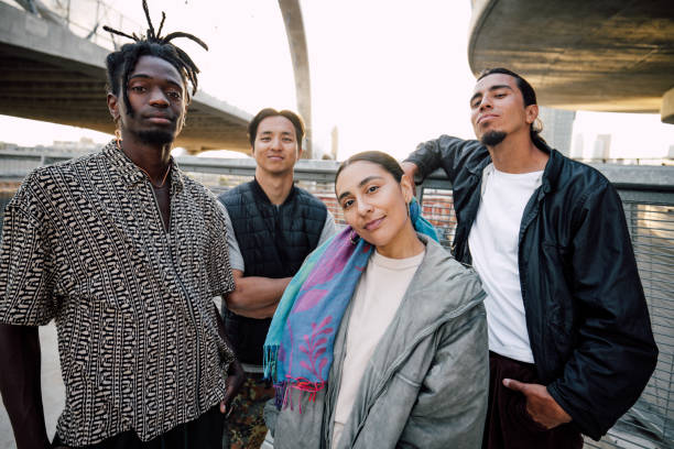 istock Group of street hip hop breakdancers posing looking to camera 2149581925
