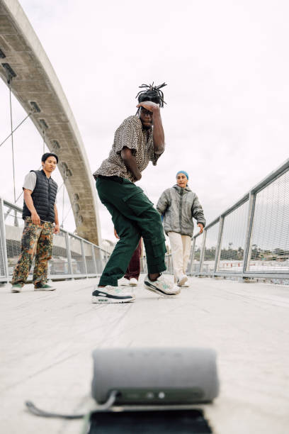 istock Young people breakdancing in the city streets 2149582023