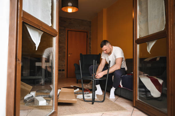 istock Man Repairing Chair. 2149583531