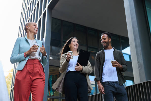 istock Group of businesspeople talking during coffee break 2149583737