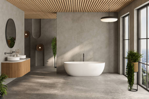 istock A bathroom with a large bathtub and a mirror 2149584896