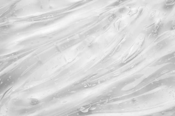 istock Transparent clear liquid serum gel cosmetic texture background 2149591120