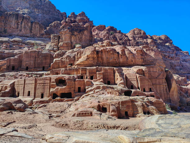 Remains of facade of the Palace tomb in the Petra historical center in the Wadi Musa city in Jordan