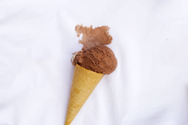 istock Dirty stain chocolate ice cream  on white clothes 2149592526