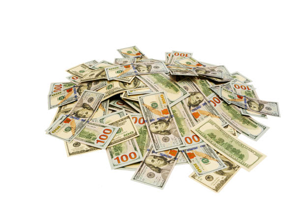 istock Large pile of one hundred dollar bills on a white isolated background. 2149593203
