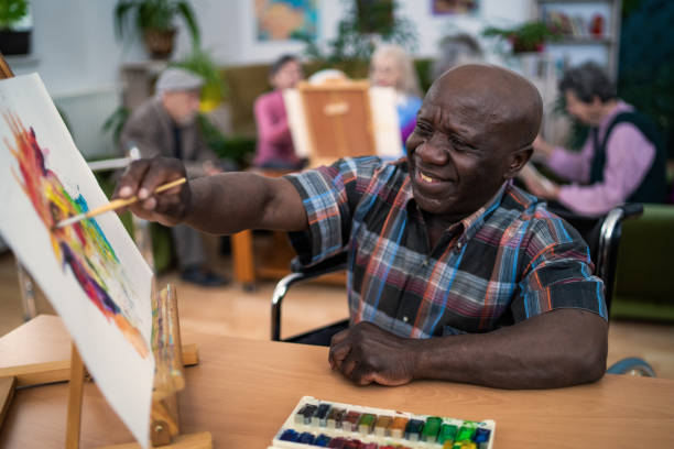 istock A senior man enjoying painting a picture 2149593585