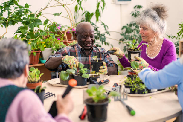 istock Residents enjoying a peaceful but sociable gardening activity 2149593587