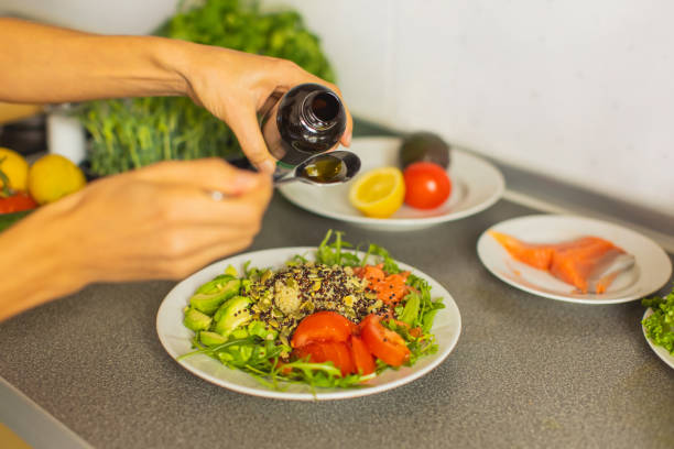 Season salad with olive oil.