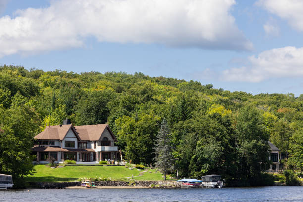 Lac St-Joseph, Quebec, Сanada - August 27, 2023: Luxurious lakefront property located in Lac St-Joseph, a rich suburb of Quebec City on a sunny day of summer.