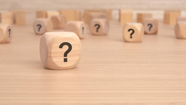 istock A mysterious wooden rectangle with a question mark engraved on it 2149601204