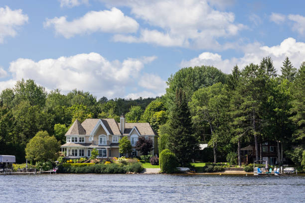 Waterfront mansion in Alexandria Bay, Thousand Islands region, New York State USA on a sunny day.