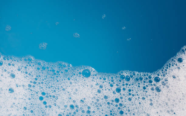 istock Detergent foam bubble on wate. Blue background, Soap sud 2149602507