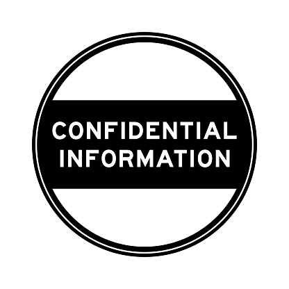 Black color round seal sticker in word confidential information on white background