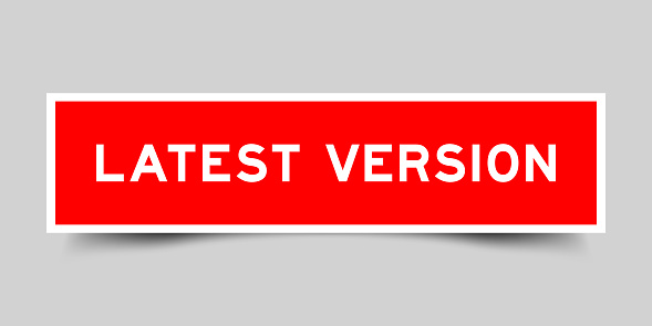 Sticker label with word latest version in red color on gray background