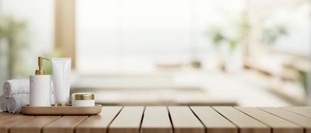 istock A toiletry spa set with an empty space on a wooden plank tabletop in a modern luxury bathroom. 2149605529