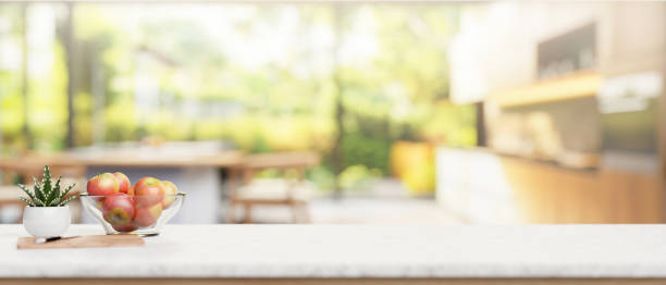 A luxury white marble kitchen tabletop in a contemporary spacious home kitchen.