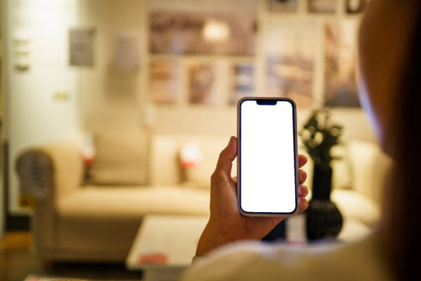 istock Woman using smartphone, a smartphone screen isolated in white with clipping path. 2149606080
