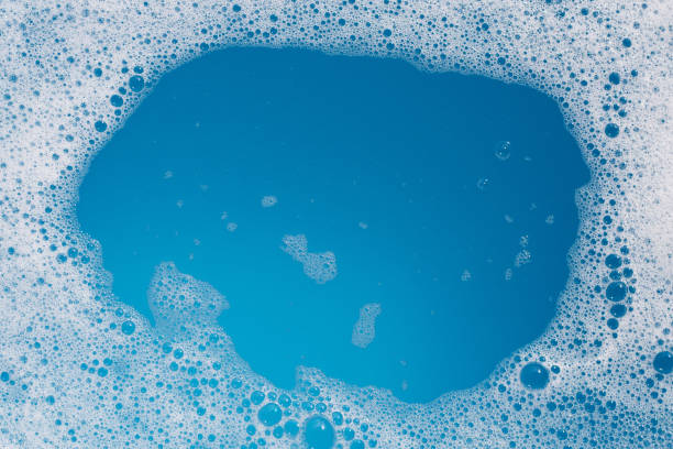 istock Detergent foam bubble on wate. Blue background, Soap sud 2149606742