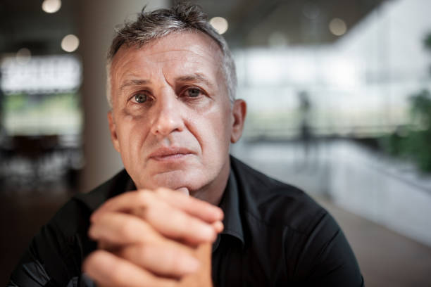 Pensive senior businessman