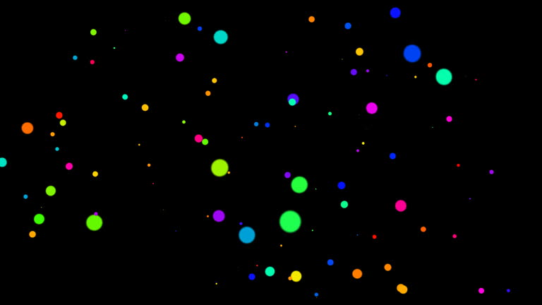 Explosion of colored dots on a black background