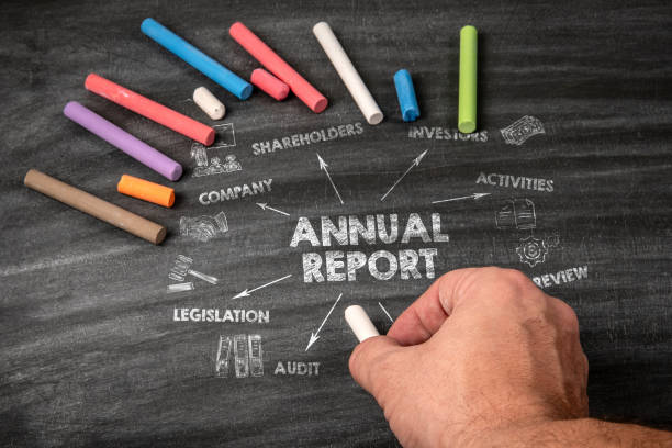 istock ANNUAL REPORT. Black scratched textured chalkboard background 2149610180