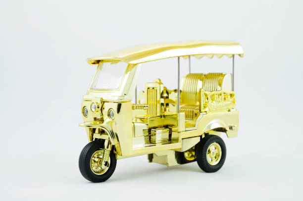 istock A Miniature Tuktuk on White Background 2149611272